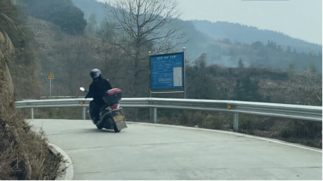 蒋光钦：摩托车上的村支书 给村民“跑”出一条致富路