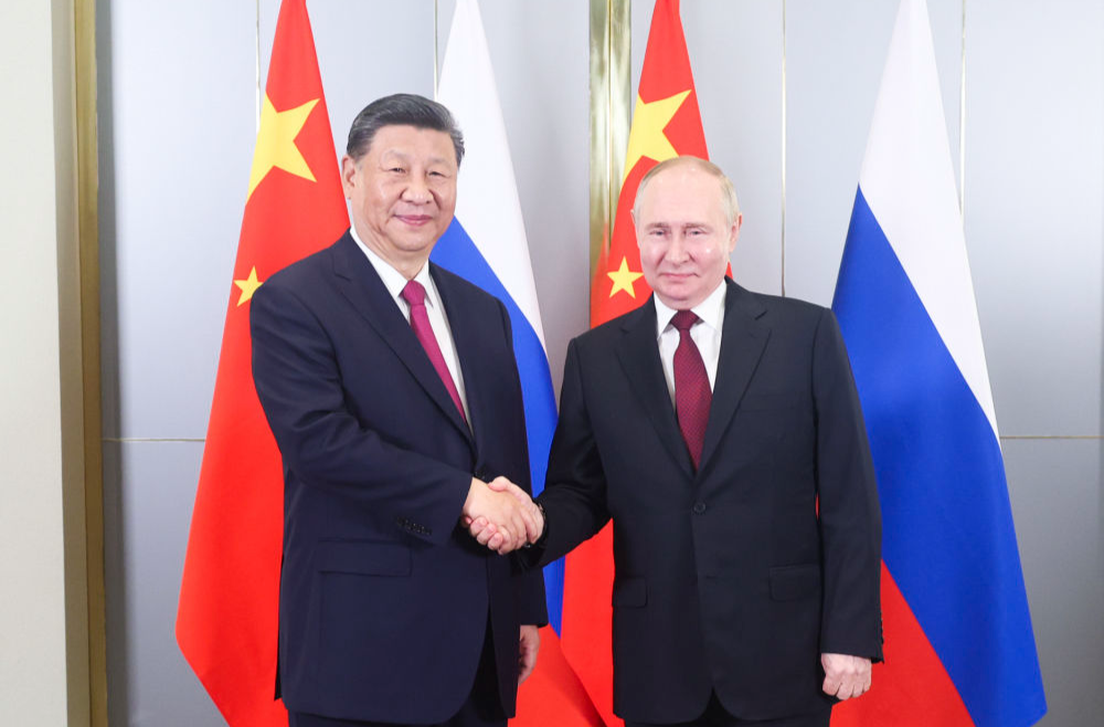 习近平会见俄罗斯总统普京