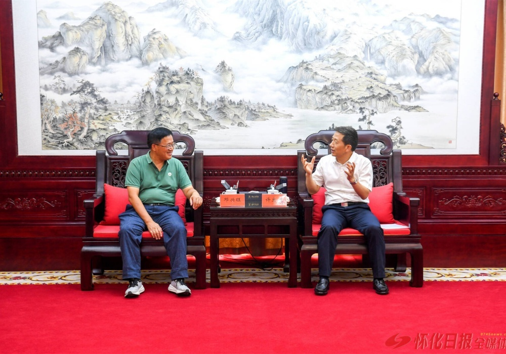 许忠建会见邓兴旺一行