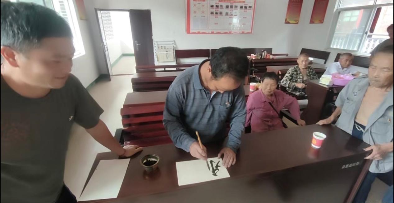 大树坳乡柑子坪村：笔墨书初心 同心跟党走